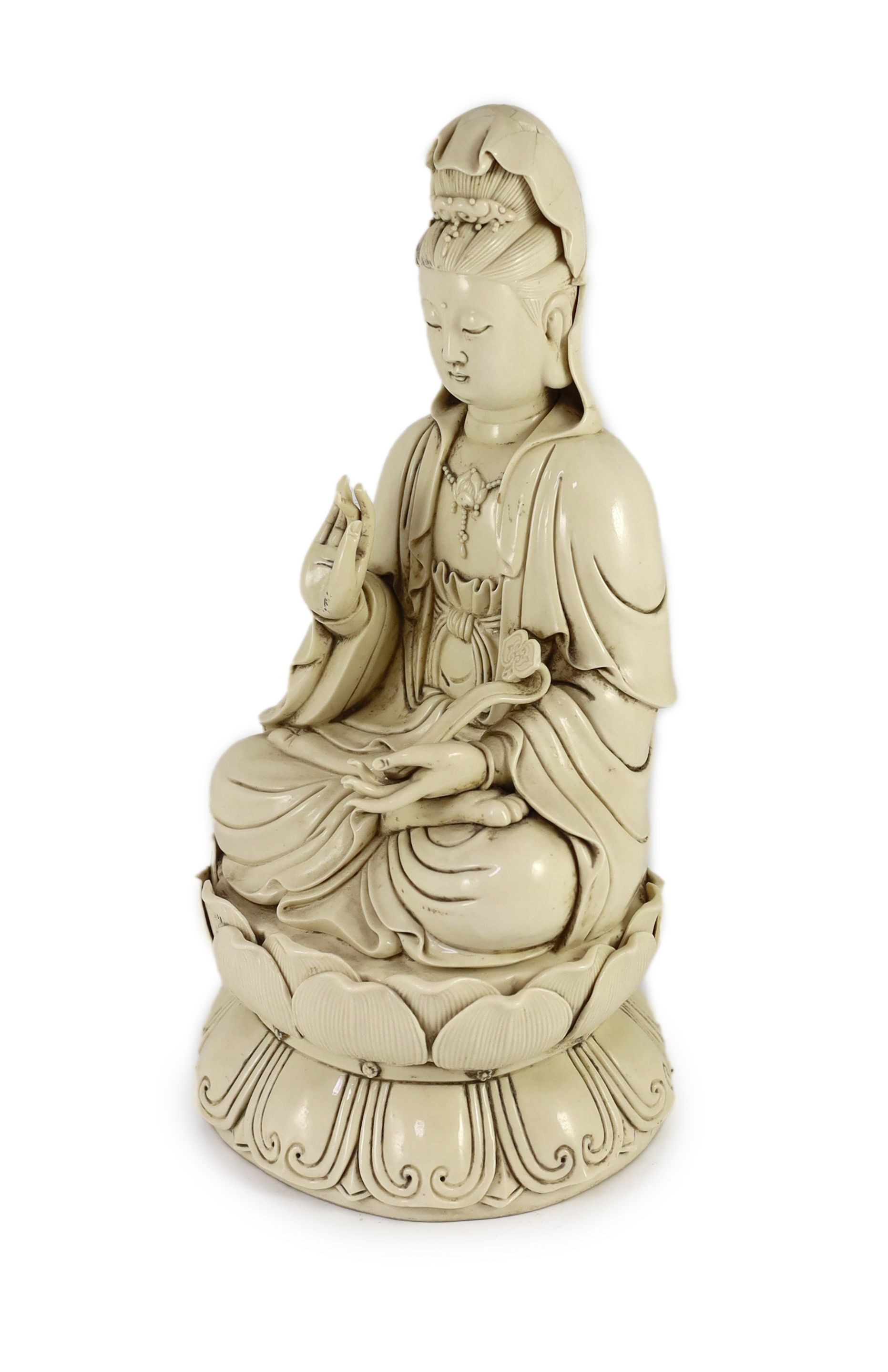 A large Chinese blanc-de-chine figure of Guanyin, Boji Yuren mark, 19th century or later, 36.5 cm high, back of head broken and re-glued